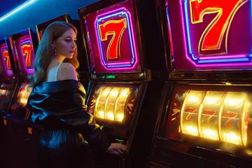 JILI7978 Jackpot Slots — Spin for massive rewards A dramatic shot of winning sevens landing on a slot reel surrounded by shining gold coins, symbolizing big wins.